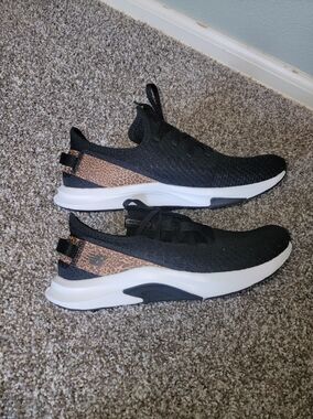 New Balance Black Knit Sneakers with Leopard Print Heel Accent